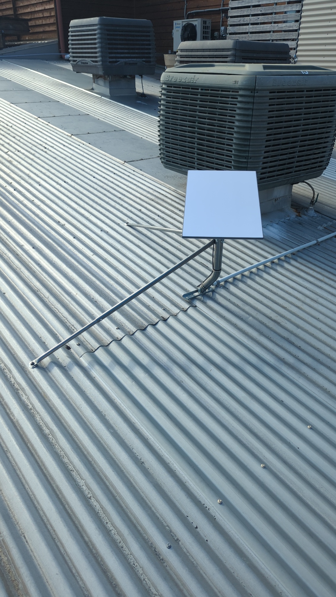 Rooftop Starlink terminal used for out-of-band management access
